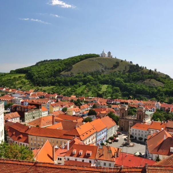day trips from vienna to mikulov in moravia - view across the rooftops to holy hill